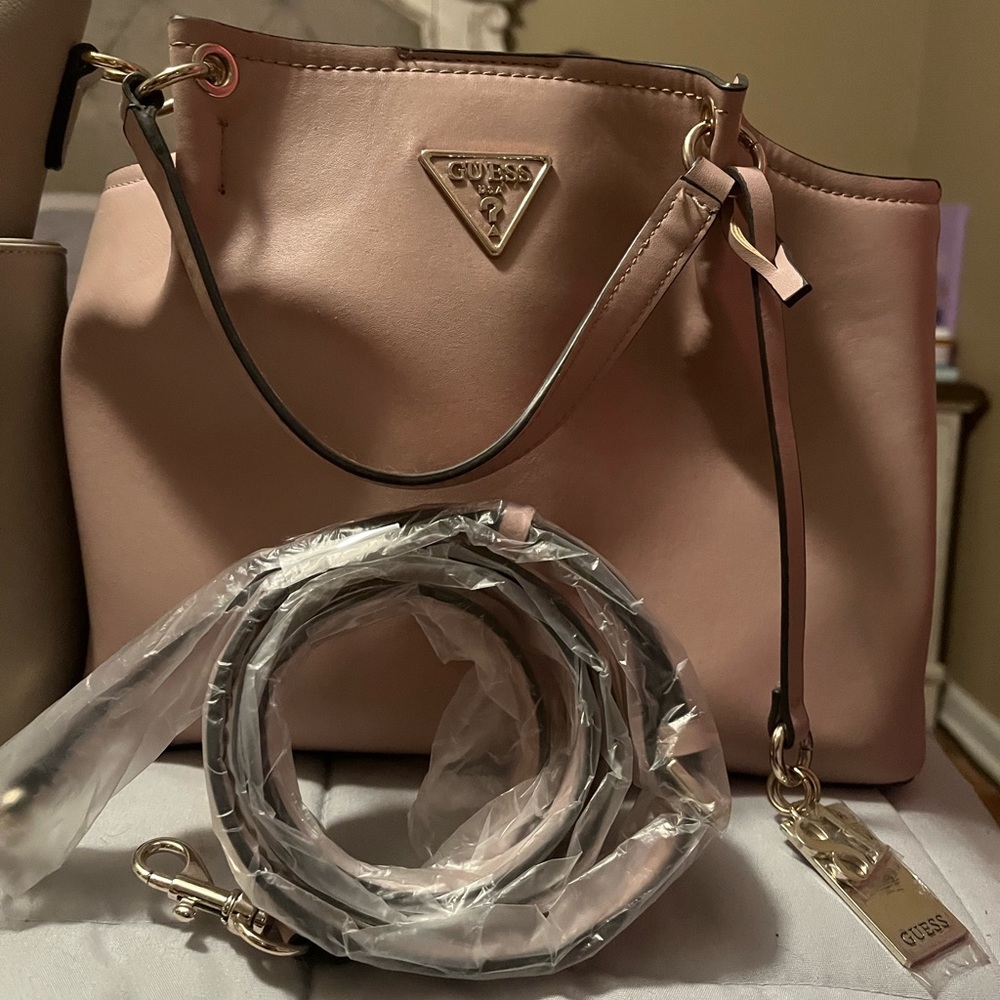 Guess pink tote. Can be used as a shoulder purse. Very clean